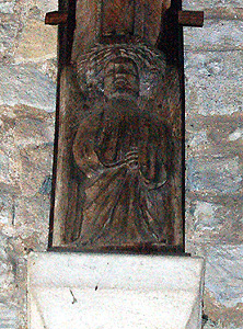 Figure at the base of a beam in the roof of the south aisle May 2011
